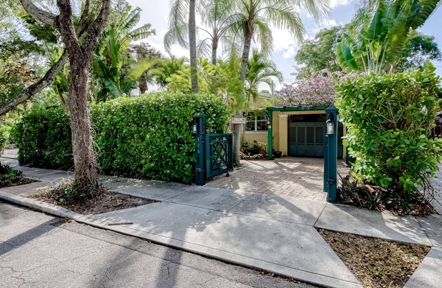 Charming vintage home with hot tub, patio, and studio apartments in back