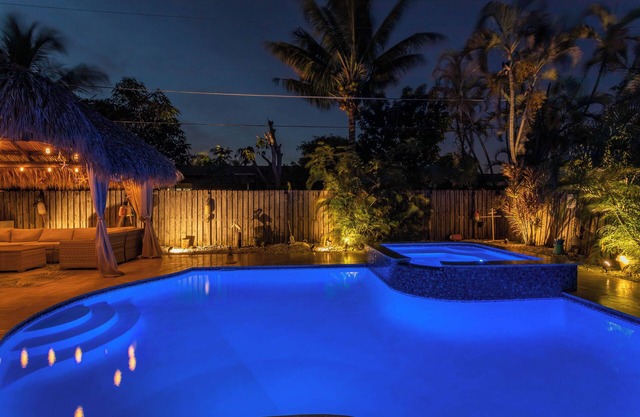 Coastal Inspired home with heated saltwater pool & spa.