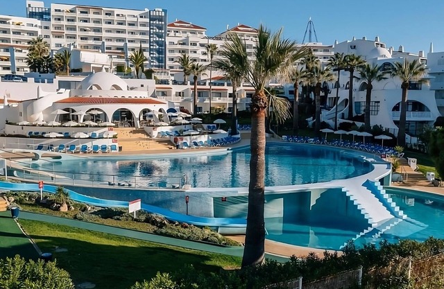 Coastal Stay with Waterslide, Buffet, Walk to Dining and Nightlife