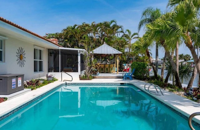 Cocoa Beach Waterfront Home with Tiki Bar and Pool