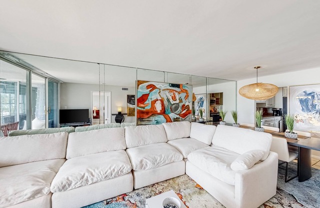 Colorful waterfront condo with pool & hot tub, AC, W/D, & WiFi - dogs OK