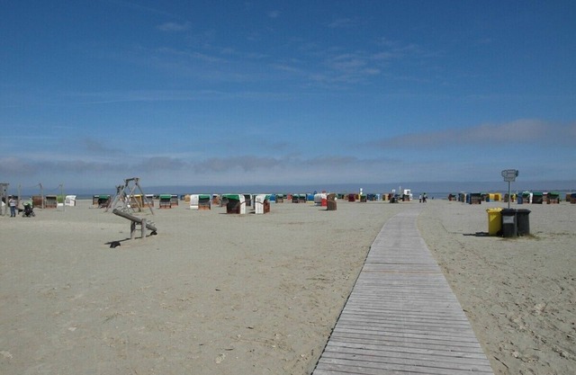 Comfortable apartment on the dike, child-friendly, garden, beach chair, WiFi