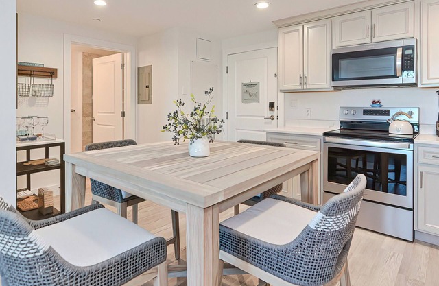 Condo unit with balcony overlooking harbor