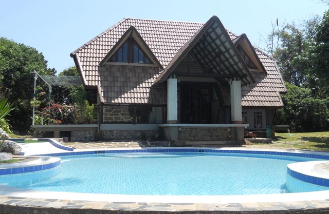 Cottage in the hill immersed in the tropical quiet