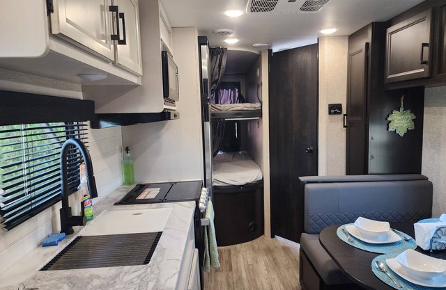 Cozy 1 bedroom and 2 full size bunk beds RV with WiFi, AC in fantastic Tucson.