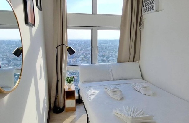 Cozy 1-bedroom condo San Lorenzo Place Makati WiFi 4KM NAIA