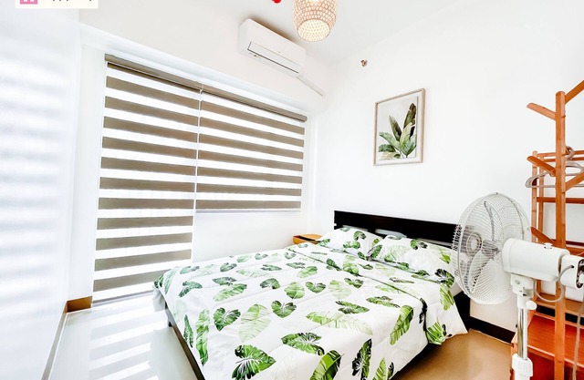 Cozy 2-Bedroom Condo Across SM Southmall with Pool, WiFi, and Kitchenette