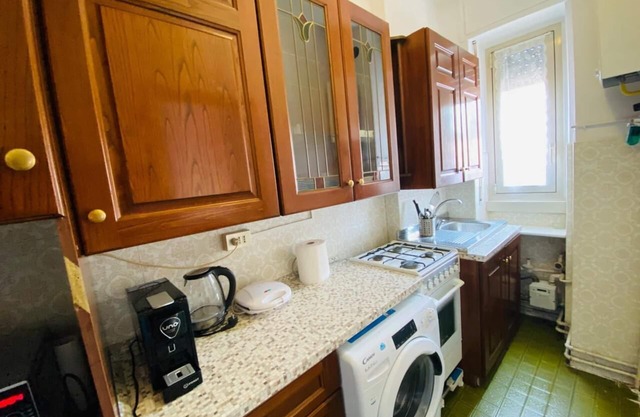 Cozy 2-BR Apartment Fully Equipped with Kitchen