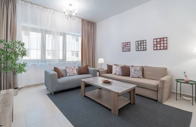 Cozy Apartment in Al Nahda with Pool and Gym