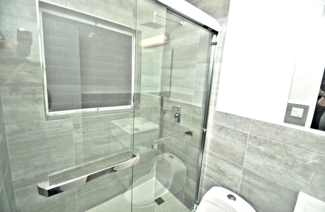 Cozy, Clean Efficiency in NE Ft. Lauderdale with large gated carport.