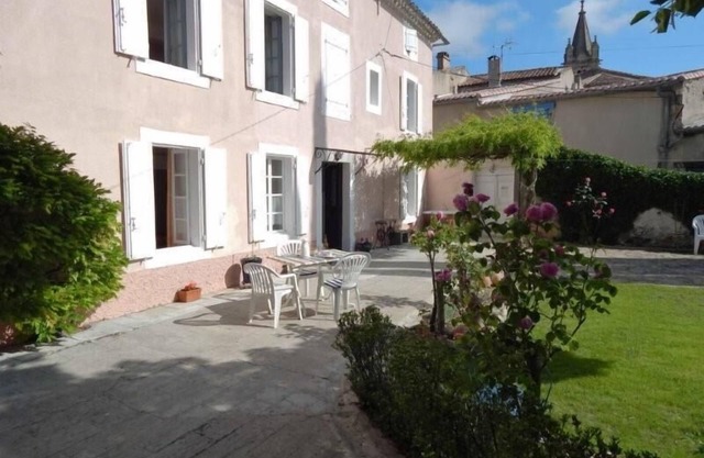 Cozy country house with a cozy yard and shady garden
