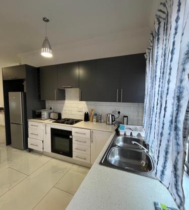 CrownHill Residence Furnished 2-Bedroom Apartment