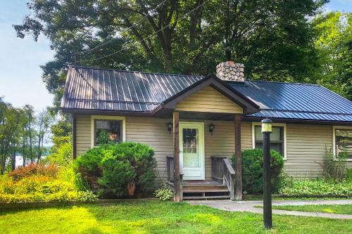 Custom-Built Lakefront Cottage with Spacious Yard!