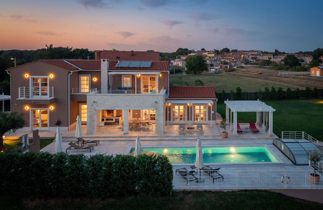 Design Villa Terra* with 48m² pool, hot tub, golf court, fitness & spa house