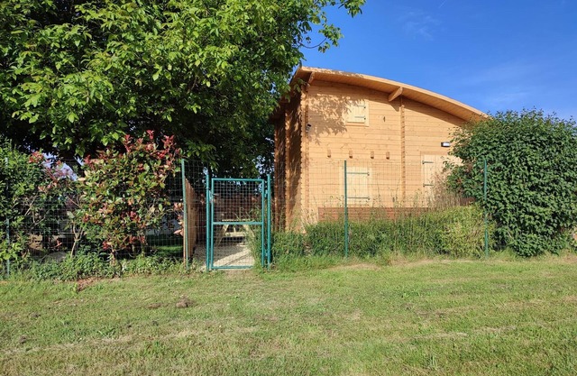 Detached chalet with unobstructed view of natural surroundings.
