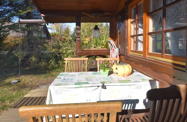Detached wooden house with fireplace and large garden near Bad Wildungen