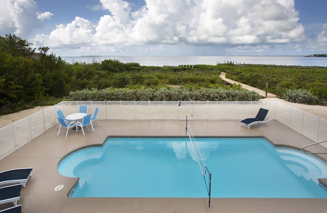 Direct Ocean View! 5 Bed/3 Bath with room for everyone. Large pool and Dock!