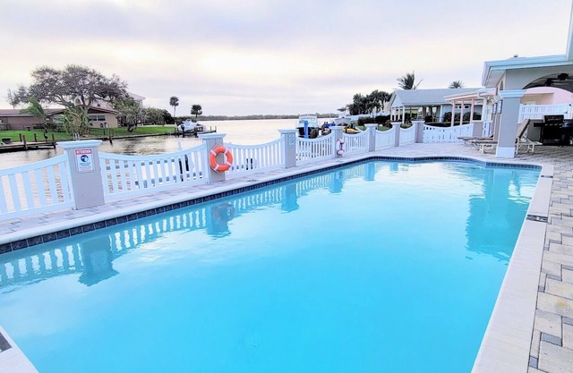 "Dive Into Fun! Spring & Summer Deals at Dolphin Cove – Walk to It All!"