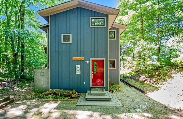 Dog-friendly home with lake views, wood stove, kayaks/SUPs, & W/D