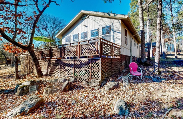 Dog-friendly lakefront getaway with a firepit, large deck, & washer/dryer