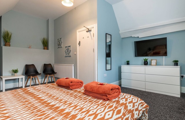 Double bedroom 1 with seating and work space