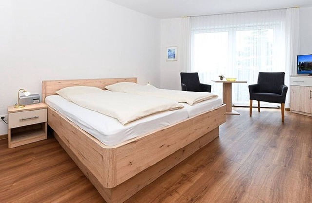 Double room with balcony or terrace - Double room in the Hotel-Pension