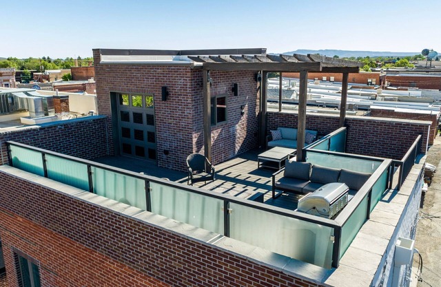 Downtown Loft- industrial modern loft-style penthouse with rooftop deck!