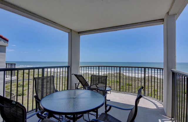 DR 2409 – Enjoy the pool, tennis and the beach from this oceanfront condo