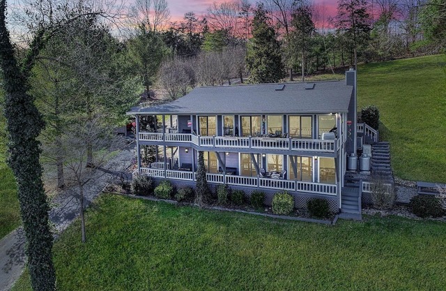 East Norris Point Breathtaking Lake View with Private Dock in Year Around Water