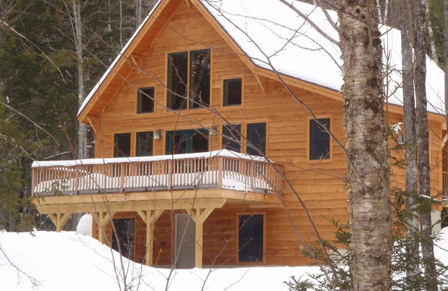 Elegant custom chalet in private wooded location close to skiing, golf, village