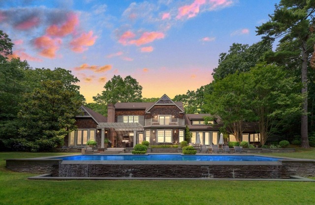 Elegant East Hampton Estate nestled on nearly 5 acres of land, stunning.