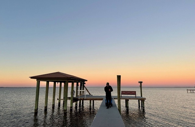 Embrace the tranquility of this Heavenly Pleasure Island Lake House.