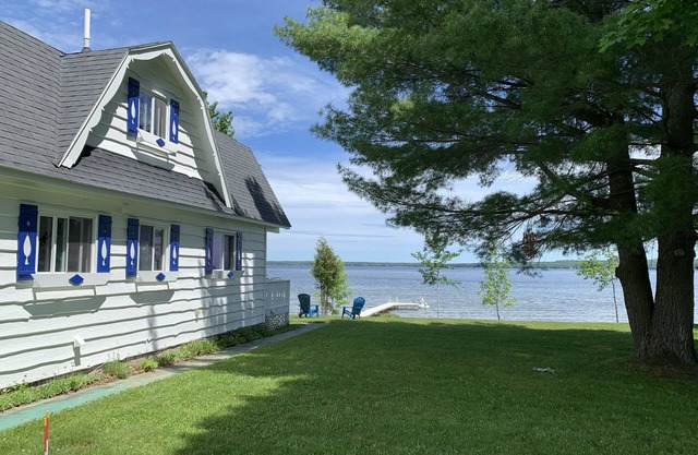 Enjoy all four seasons at the Swiss Chalet located on the shore of Burt Lake.