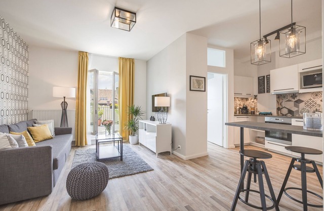 Enjoy the large terrace of your new apartment near the City Park!
