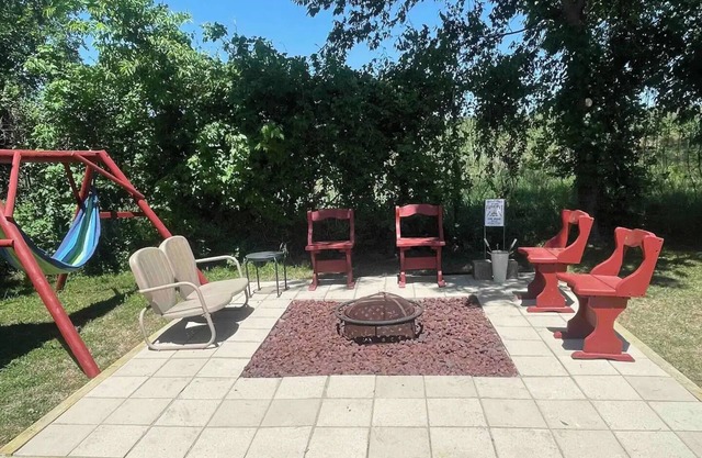 Enjoy the river with a pool, firepit and a balcony with a gorgeous water view.