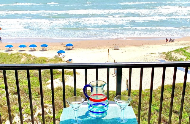 ESCAPE to Bright Top Floor Beachfront Condo in Perfect Location