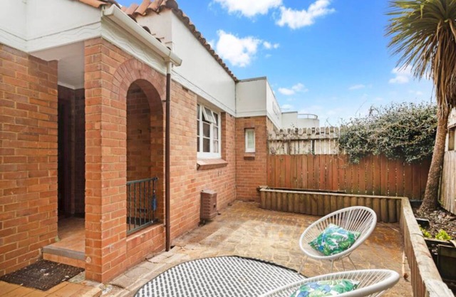 Escape to this sun-kissed double bedrooms Mount Eden mountain view house