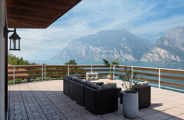 Exclusive residence in Torbole with breathtaking views, large terrace.
