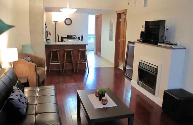 EXECUTIVE LUXURY DOWNTOWN CONDO LOCATED BY THE OLD PORT WITH FREE GARAGE PARKING