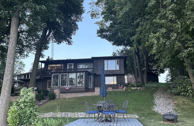 Experience lakeside luxury with stunning views and elegant spaces