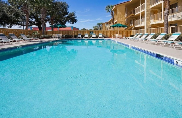 Experience Value & Comfort Minutes from Orlando International Airport! | w/Pool