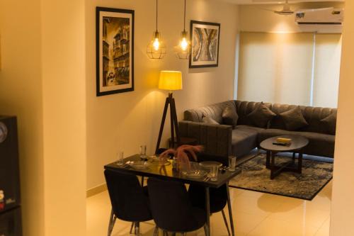 Exquisite 2BR in DHA with pool, gym, cinema & balcony