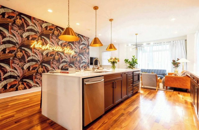 Fall skyline rooftop decks, karaoke garage, game room near Broadway