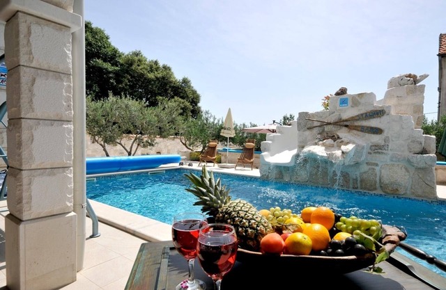 Family friendly house with a swimming pool Plano, Trogir (K-23902)