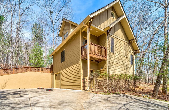 Fantastic outdoorsy retreat with pool access, private hot tub, and game room