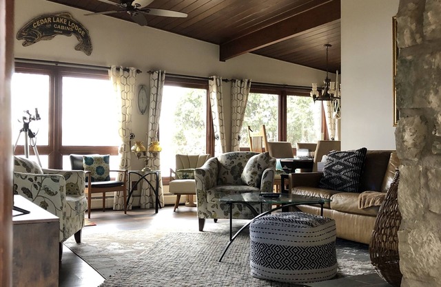 Fenced in yard! Lovely Mid Century Feel with all Bedrooms facing the Water!