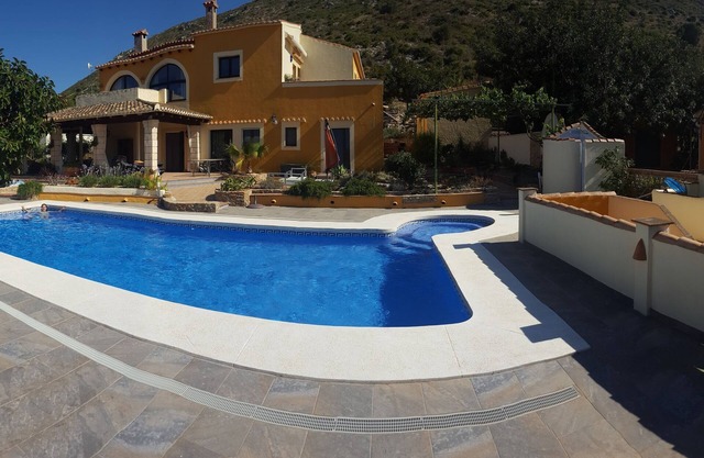 finca with large pool and garde, quiet location near town, small urbanisation