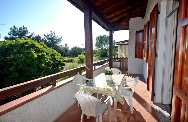 First floor villa with large terrace, garden and parking space