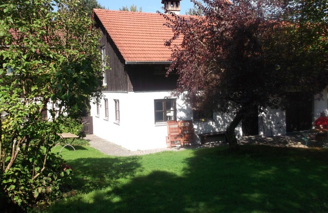 Former farmhouse in a forest clearing
