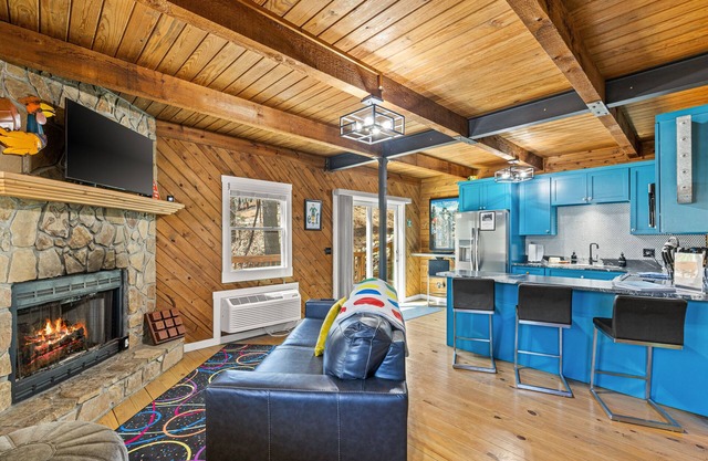 Gaming-themed cabin in Blairsville with arcade consoles & foosball